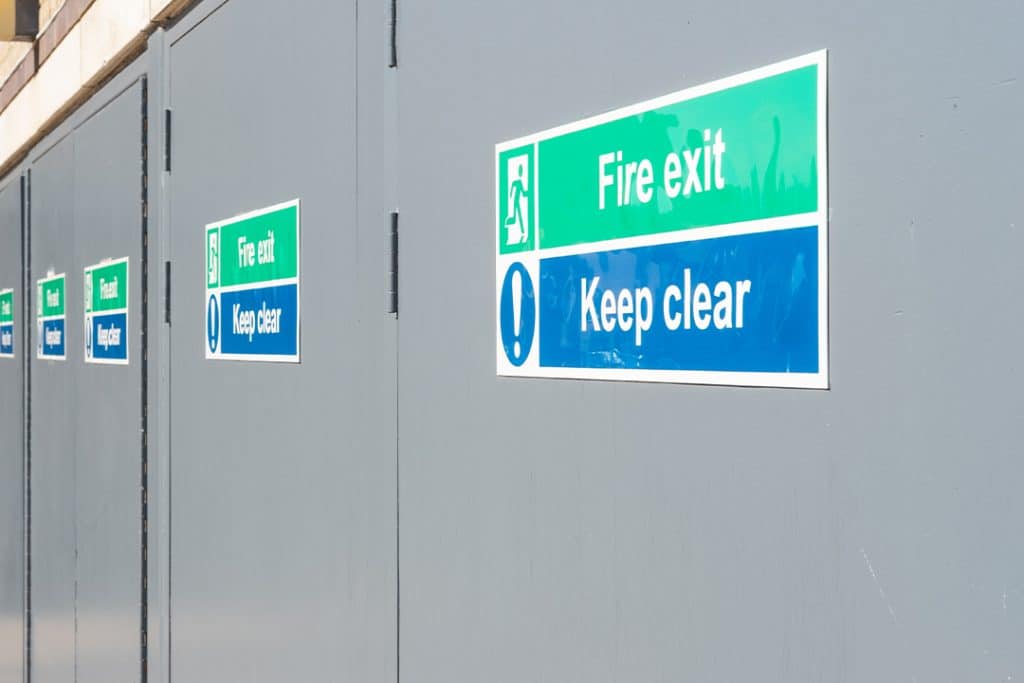 fire exit signs on doors outside