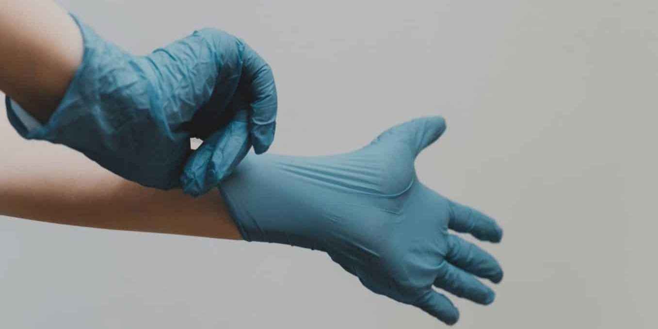 Blue hospital sterile gloves